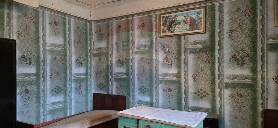 Teren si casă cu teren generos în Socodor