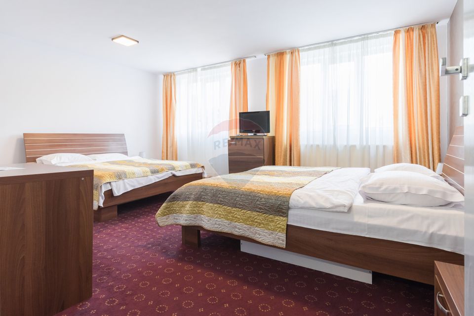 Hotel cu 23 unități de cazare, 2 săli de ședință, locație excelentă
