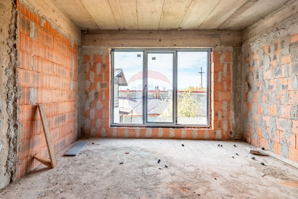 Casa / Vila la rosu in Chitila / Strada Rudeni - teren 264 mp