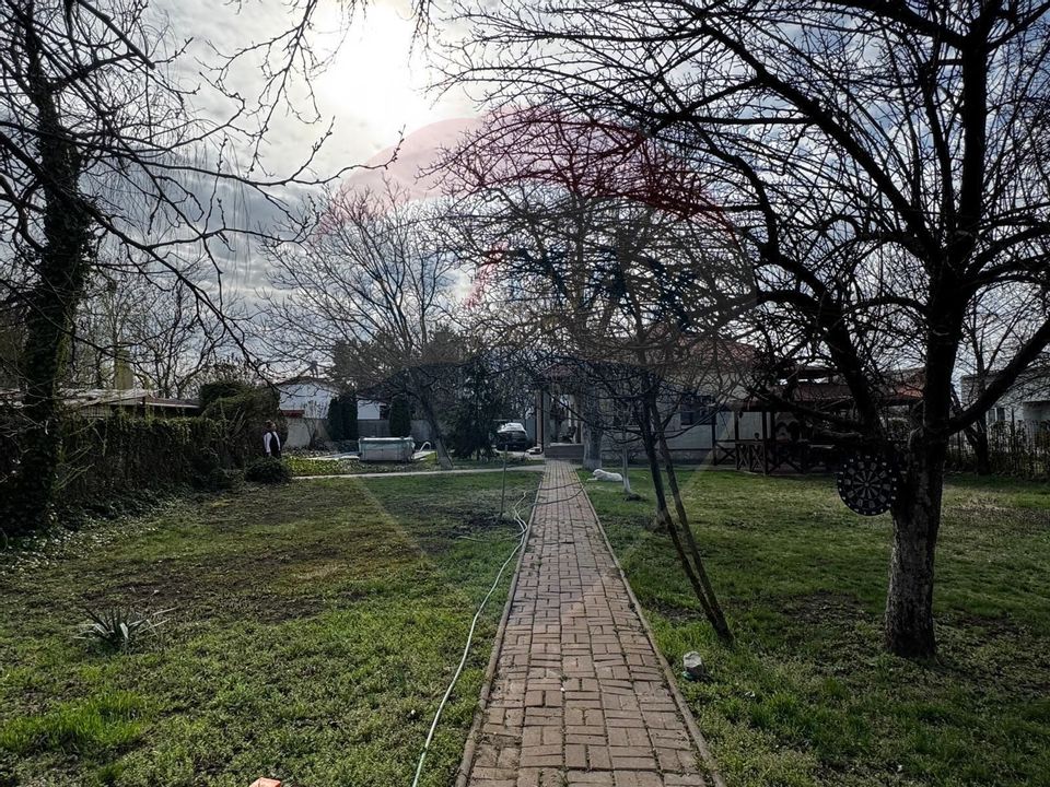 Casă de vânzare cu livadă și piscină – Giurgiu