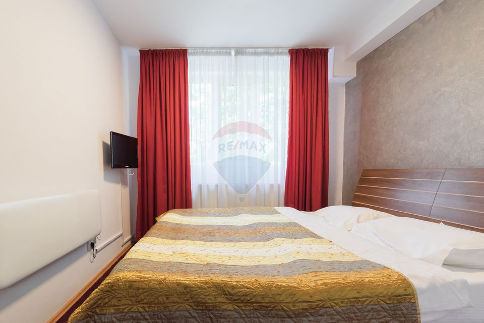 Hotel cu 23 unități de cazare, 2 săli de ședință, locație excelentă